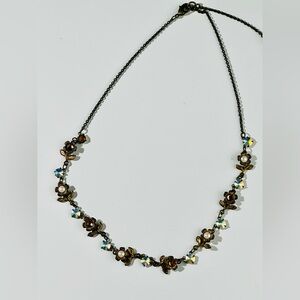 Flower necklace Michael Negrin. Beautiful brass and iridescent stones and pearl